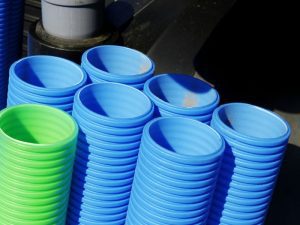 PVC pipes stacked vertically for tool shed organization